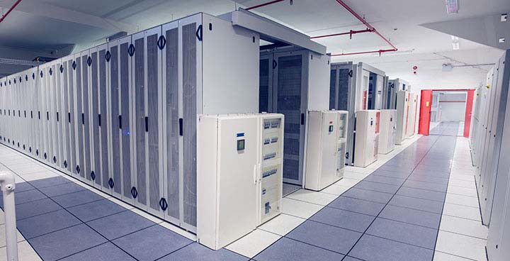 Speed Meets Precision: Fast-Tracking Your Data Center; Empty hallway of server towers
