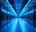 Wide corridor of illuminated server racks in a modern blue-lit data center